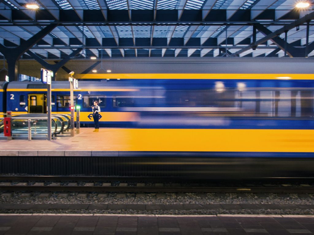 Lyft Passenger Accident Lawyer in Bellerose – commuters on a train platform