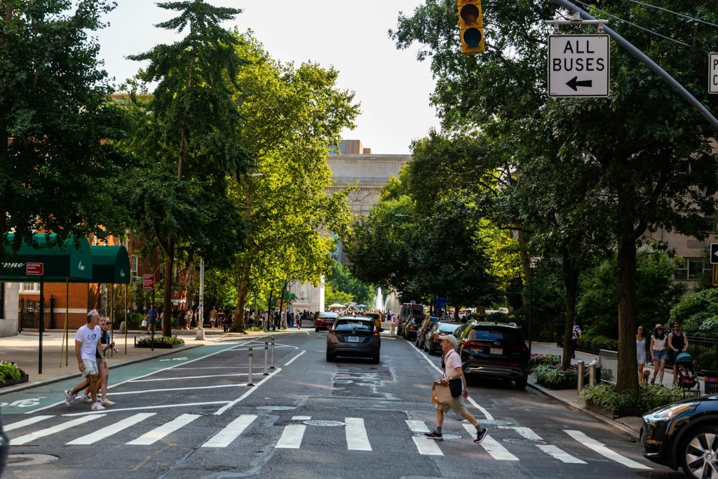Uber Accident Lawyer in Bellerose – pedestrians crossing a city street
