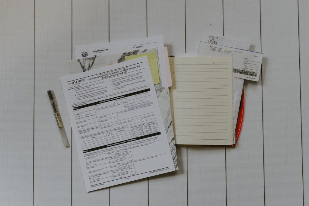 Uber Accident Lawyer in Bellerose – stack of claim paperwork