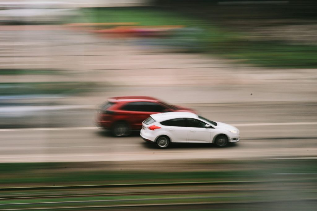 Uber Passenger Accident Lawyer in Bellerose – cars moving fast on a road